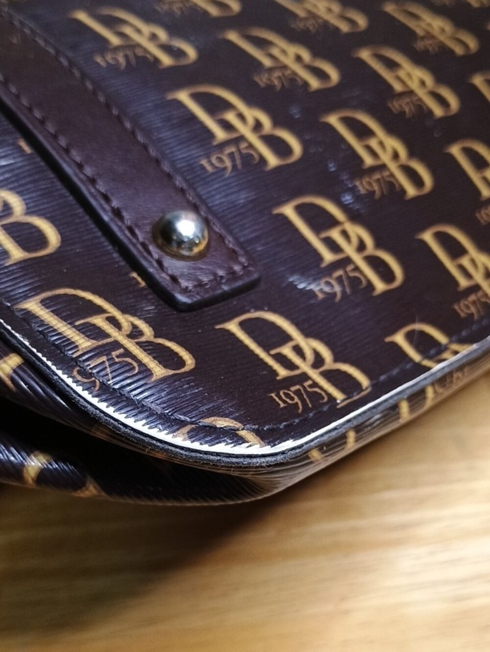 Dooney & Bourke Sutton Brown Logo Drawstring Bucket Bag with Red Interior - Picture 12 of 12